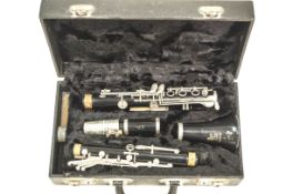A Boosey & Hawkes 'Regent' Clarinet, serial number 483318, in a plush lined case.