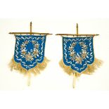 A pair of Victorian shield shaped beaded face screens,