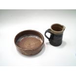 A David Leach studio pottery round bowl, with incised decoration on a light brown "ribbed" ground,