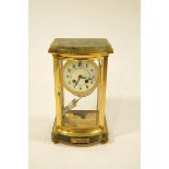 An early 20th Century French gilt metal and marble four glass mantel Clock, eight day movement,