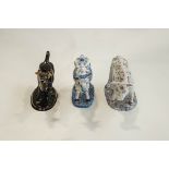 Three ceramic models of dairy cows as creamers, one with Delft style glaze decor,