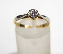 An early 20th century gold and diamond solitaire ring, the old-cut stone approximately 0.