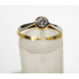 An early 20th century gold and diamond solitaire ring, the old-cut stone approximately 0.