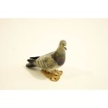 A Beswick model of a Pigeon, factory marks to base,