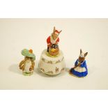 A Royal Doulton Bunnykins musical 'Santa Claus', a Royal Doulton Mrs Bunnykins 'Clean Sweep',