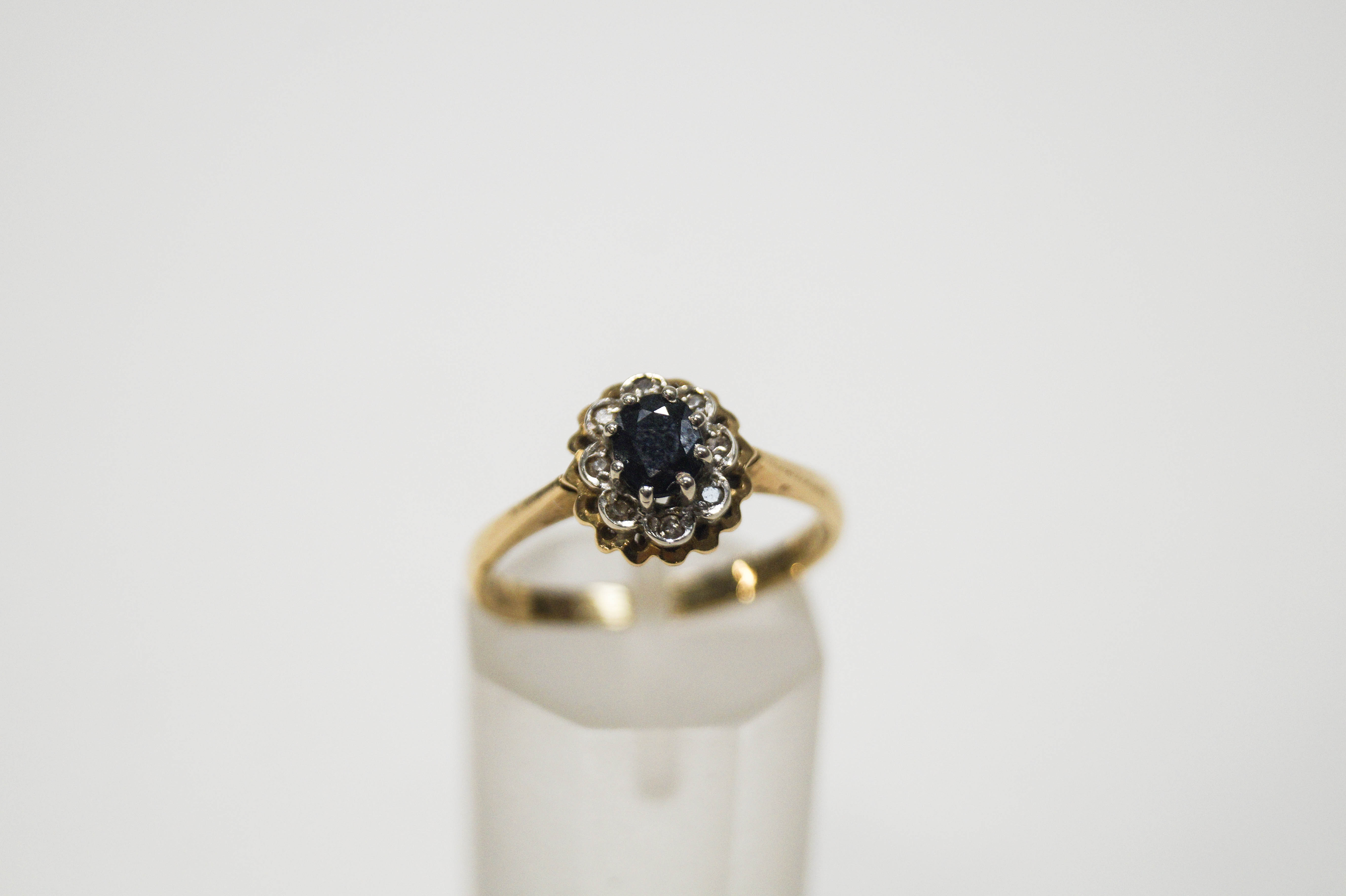 A small sapphire and diamond oval cluster ring, - Image 2 of 2