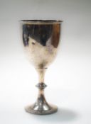 A silver goblet with a moulded rim and beaded knopped stem and round foot,