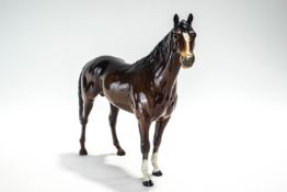 A large Beswick brown horse with black printed marks