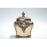A Walker & Hall Silver plated tea caddy, of rectangular baluster form, with Rococo style decoration,