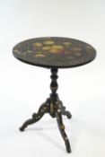 A Victorian snap top pedestal table, with lacquered and painted floral decoration,