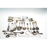 A collection of assorted plated flatware; with a metal bangle; a chain;