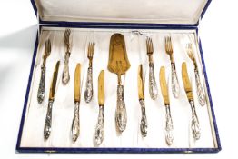A German dessert knife and fork set, the six knives and six forks with a serving slice,