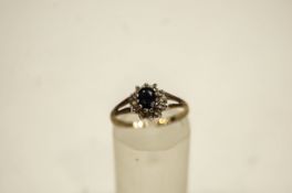 A 9 carat gold cluster ring, finger size L, 1.