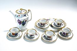 An early 20th Century Royal Copenhagen coffee service, decorated with floral sprigs,