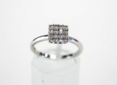 A sixteen stone diamond 18 carat white gold cluster ring,