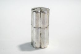 A silver table cigar box, of cylindrical cinquefoil outline, 9.3 cm high, 140g (4.