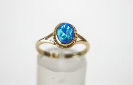 A 9 carat gold synthetic opal ring, finger size N, 1.