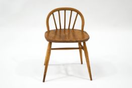 An Ercol elm and beech low back chair,