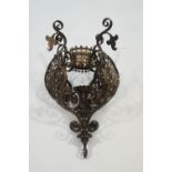 A Victorian elaborate metal hanging light,