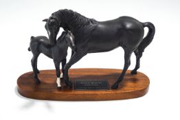 A Beswick Connoisseur model of Black Beauty & foal,