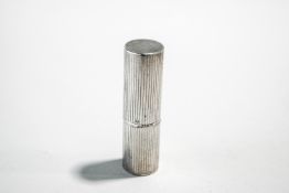 A silver perfume atomiser, London import marks for 1990, with reeded decoration, 6.