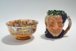 A Royal Doulton Dickens Ware bowl and a Royal Doulton Bacchus character jug