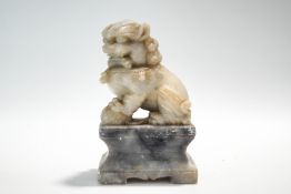 A Chinese carved hardstone Dog of Fo,