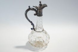 A Victorian cut glass claret jug with plated mounts,