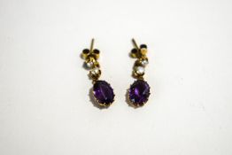 A pair of Edwardian Amethyst and seed Pearl drop earrings