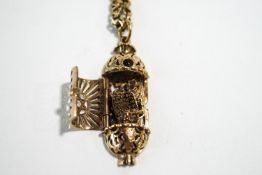 A Jewish gold Mezuzah charm pendant,