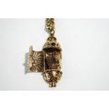 A Jewish gold Mezuzah charm pendant,