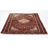 A 20th century Persian carpet with geometric decoration,