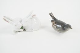 A Royal Copenhagen figure group of two rabbits eating lettuce,