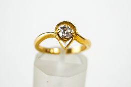 An 18 carat gold single stone diamond ring, the old brilliant cut of approximately 0.