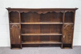 A 20th Century oak dresser rack,