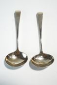 A pair of Georgian silver sauce ladles, London 1805, old English pattern, monogrammed, 16.