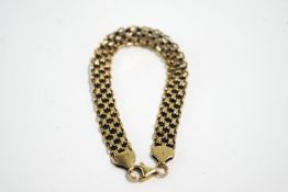 A 9 carat gold bracelet, of wide links, 6.