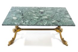 A modern brass and green marble coffee table, the feet cast as mythical birds' heads,