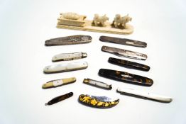 A collection of penknives and fruit knives, some silver, mother of pearl,