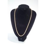 A 9 carat gold necklace, of hollow round belcher links, 60 cm long, 20.