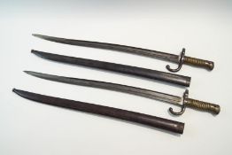 Two French bayonets, both with inscriptions to the blades, one stamped R.42280, the other S.