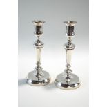 A pair of silver candlesticks, London 1920,