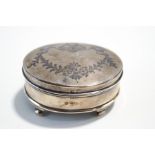 A silver oval trinket box, marks rubbed, engraved with Neo classical garland and swag decoration,