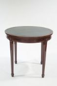 An Adam style mahogany table, the circular leather inset top upon tapering legs,