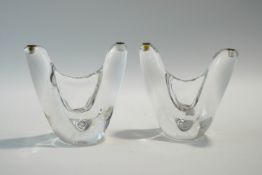 A pair of Schneider clear glass double candlesticks, etched signature to base,