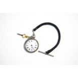 A silver coloured fob watch, stamped '800', with an enamel dial,