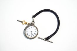 A silver coloured fob watch, stamped '800', with an enamel dial,