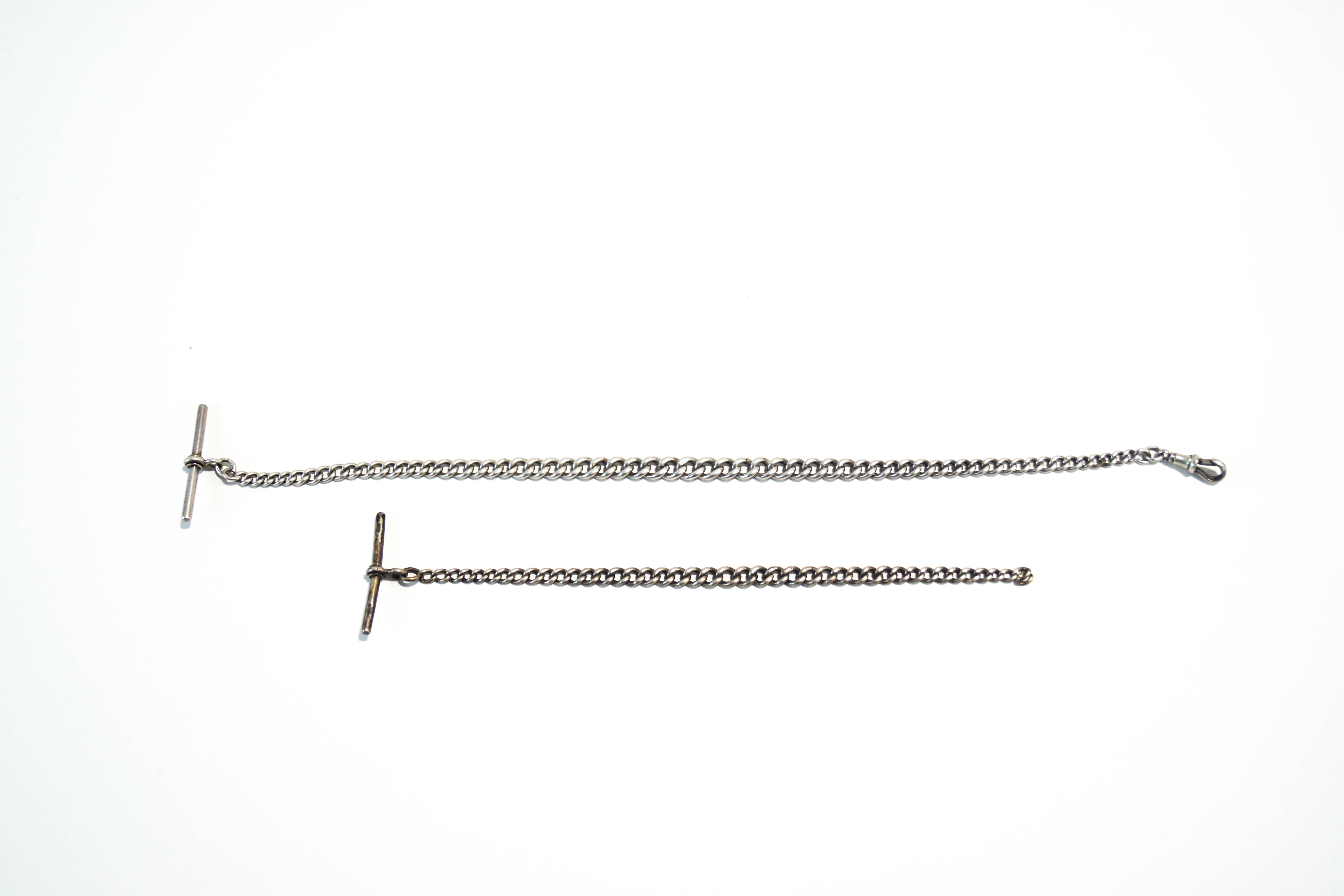 A silver watch chain; and another similar; 30.5 cm long and 18.5 cm long, 44.9 g (1. - Image 2 of 2