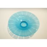 A Schneider blue glass footed dish, printed factory marks to base,