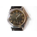 Omega, stainless steel military wrist watch, manual wind, black dial with luminous chapter,